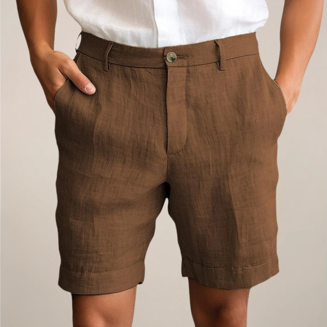 Close-up of comfortable men's beach shorts fabric and elastic waist, perfect for summer casual wear.