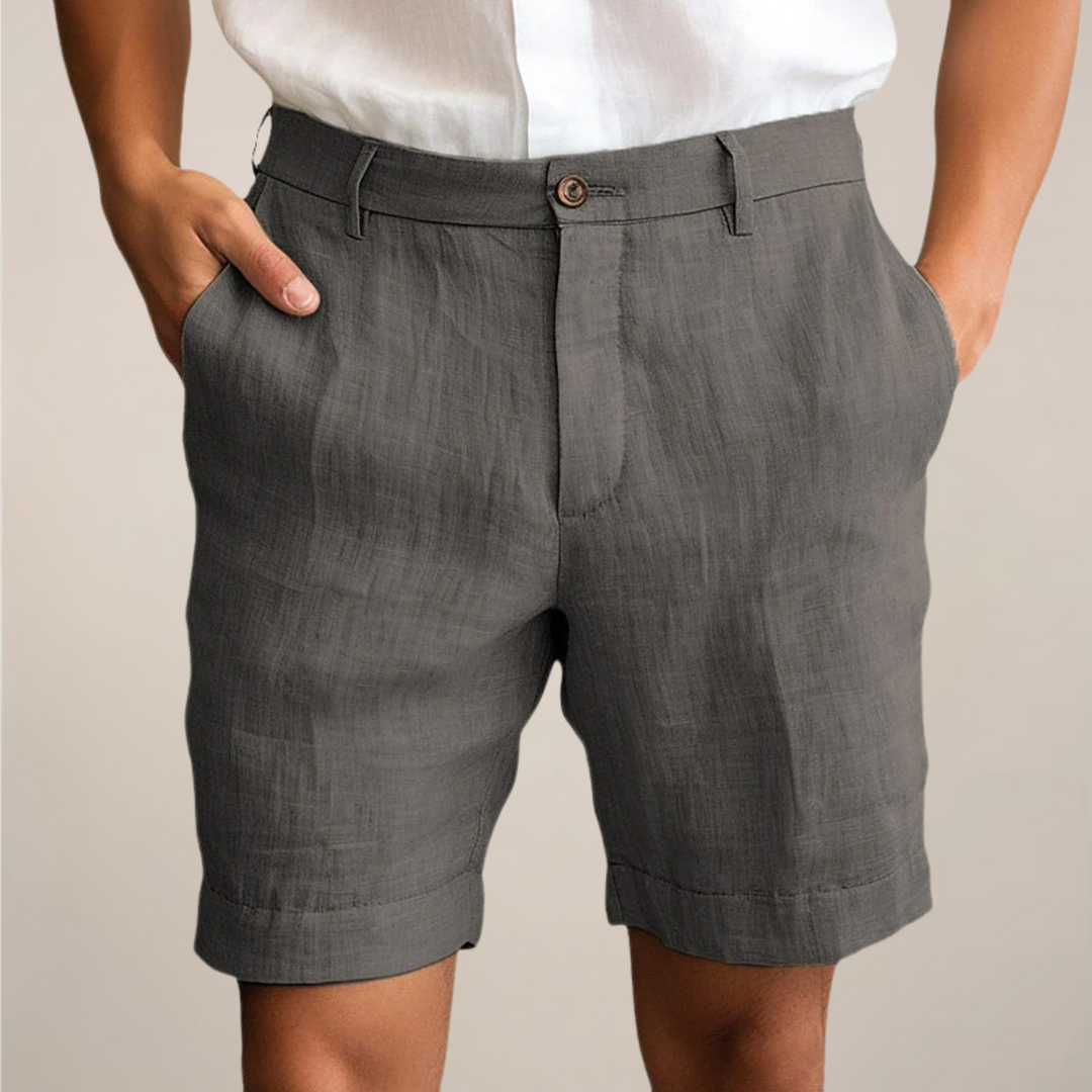 Blue men's summer beach shorts, relaxed fit, elastic waist, ideal for warm weather and travel.