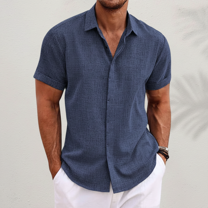 Comfortable men's summer button-up shirt. Versatile short-sleeve menswear for relaxed casual style.