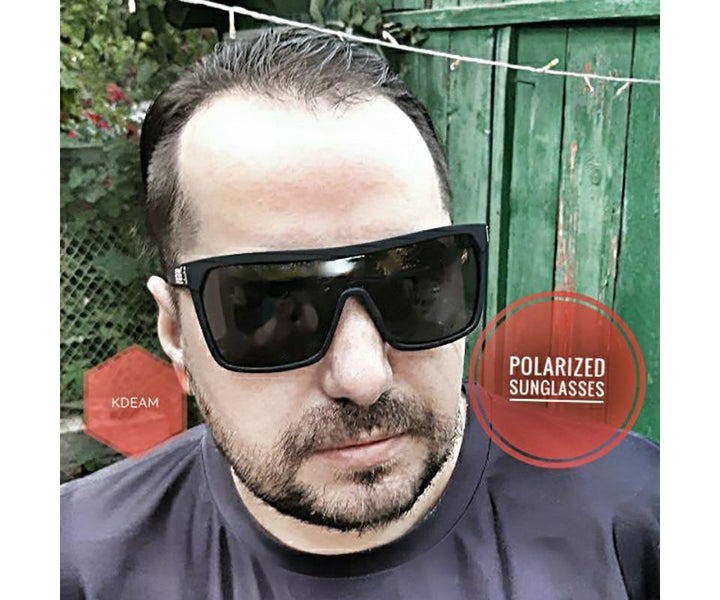 High-quality men's sunglasses, polarized, UV protection, flexible frame for outdoor sports.
