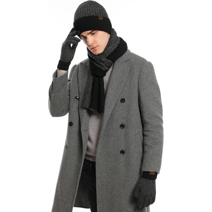 Navy blue men's knitted winter hat, matching scarf, and smartphone gloves for ultimate warmth.