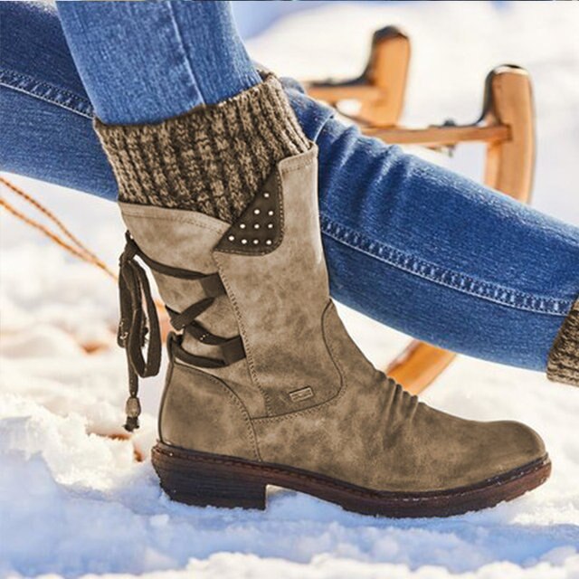 Women's warm mid-calf snow boots by Bianca. Essential winter footwear for cold weather & outdoor adventures.