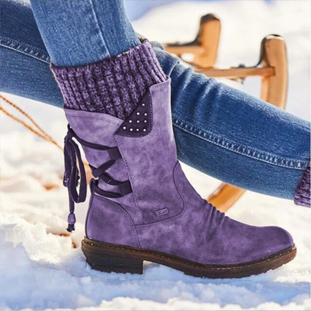 Women's Bianca mid-calf snow boots, ideal for warmth & style in winter weather. Cozy and comfortable ladies' footwear.