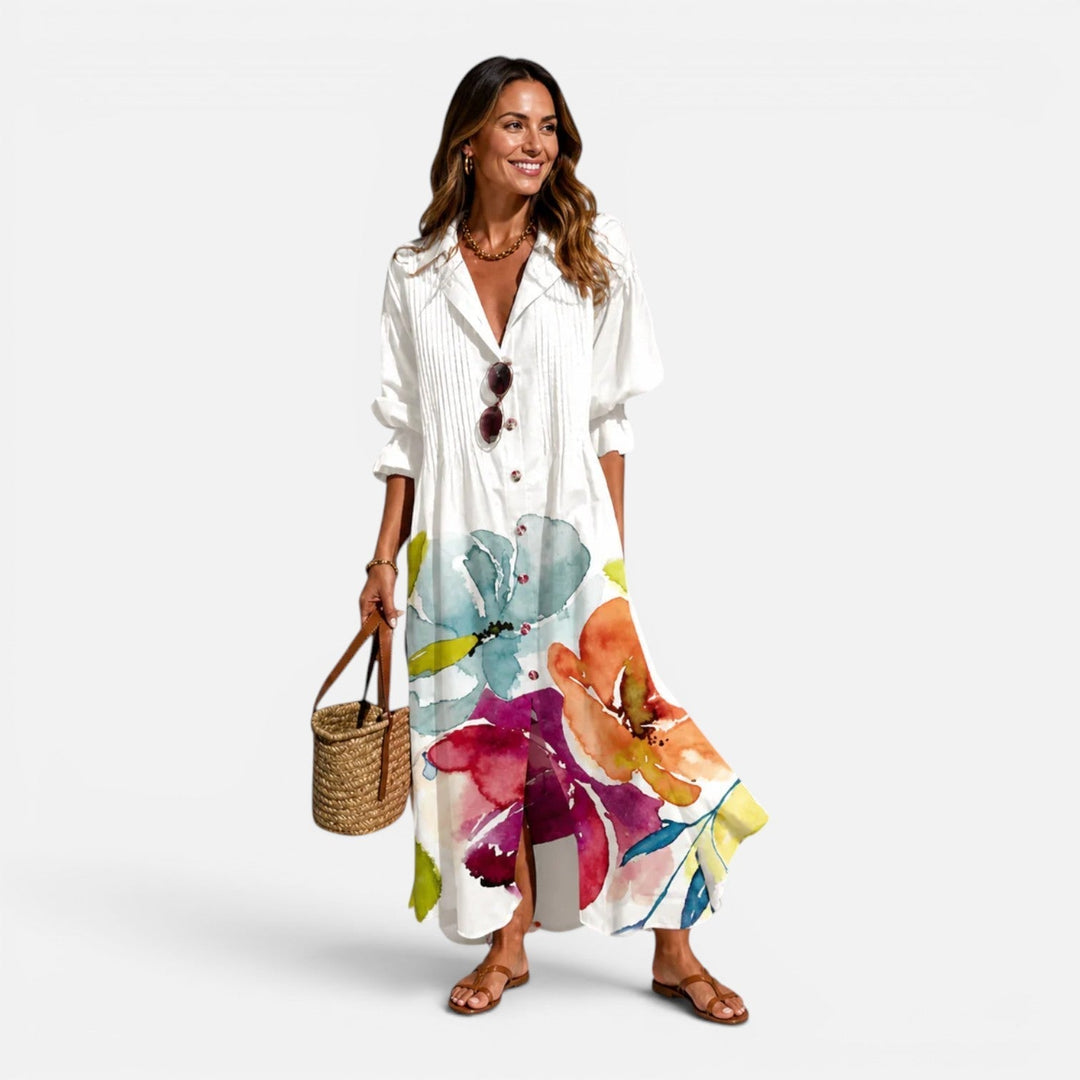 Comfortable women's relaxed floral print maxi dress, flowing fabric & vibrant design. Great for summer casual wear.