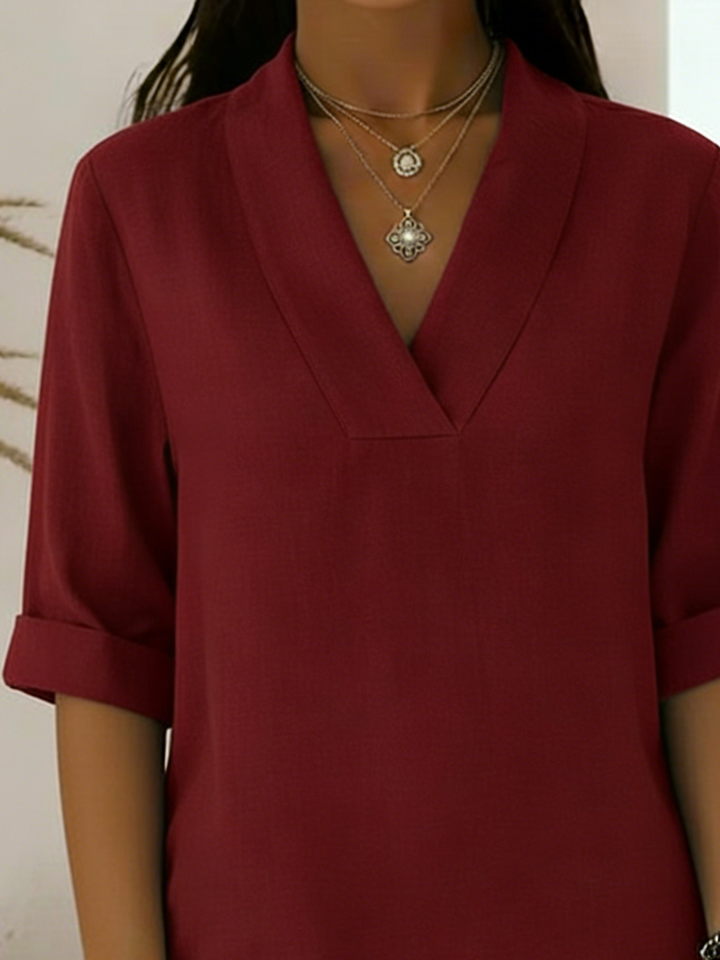 Chic V-neck roll-sleeve tunic top for women. Perfect smart casual blouse for office or weekend.