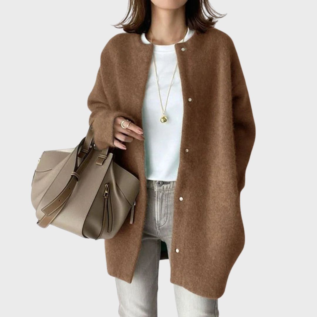 Relaxed fit women's long cardigan with functional buttons. Great for effortless layering & fall/winter style.
