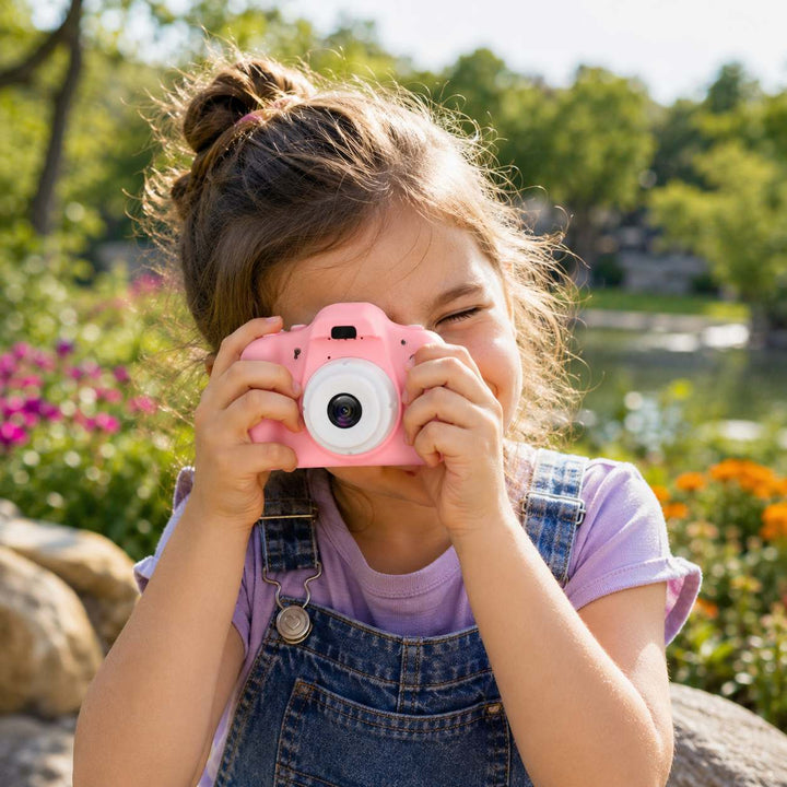 Unisex mini digital camera for instant memories; a powerful, portable video and photo recorder.