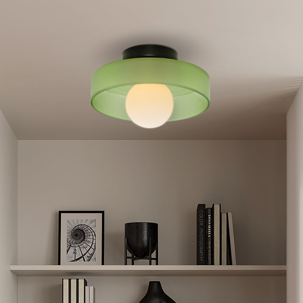 Contemporary flush mount ceiling light with a sleek, low-profile design. Ideal for modern home lighting and minimalist decor.