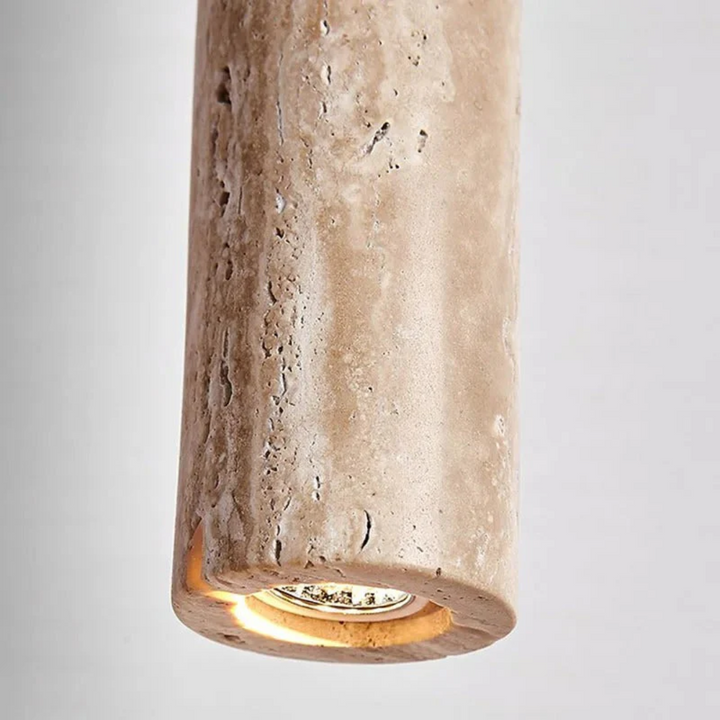 Modern Wabi-Sabi LED ceiling lamp, minimalist pendant fixture providing ambient lighting for a living room.
