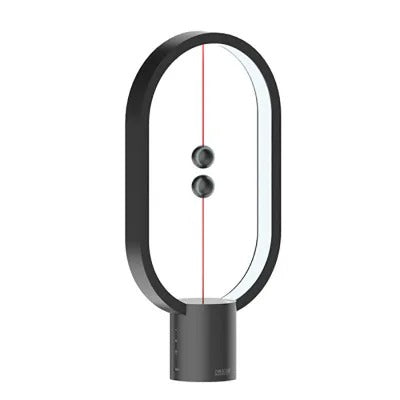 Contemporary LED table lamp, minimalist balance design, and innovative floating switch for soft light.