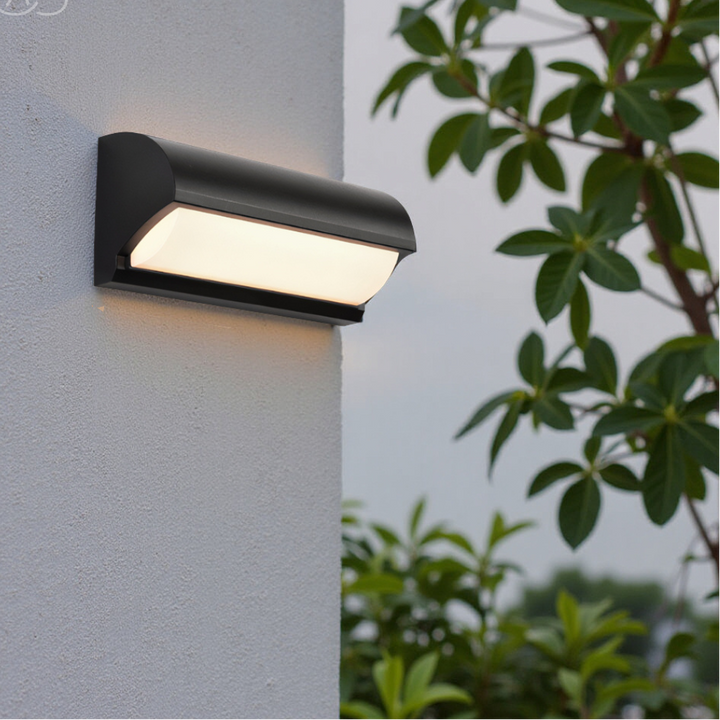 Durable black LED outdoor wall lamp, weatherproof for garden, patio, and exterior.