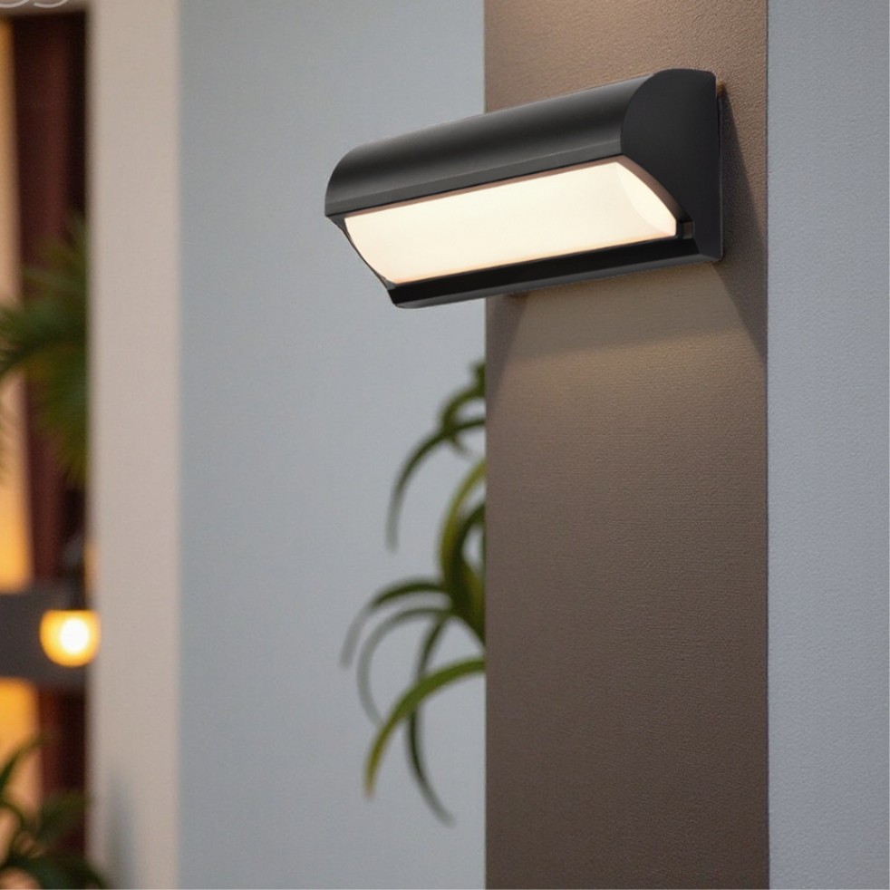 Energy-efficient black LED outdoor wall light for modern garden & patio illumination.