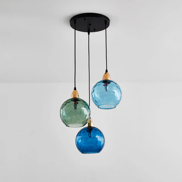 Designer quality modern 3-light cascade pendant light, perfect for living room interior.
