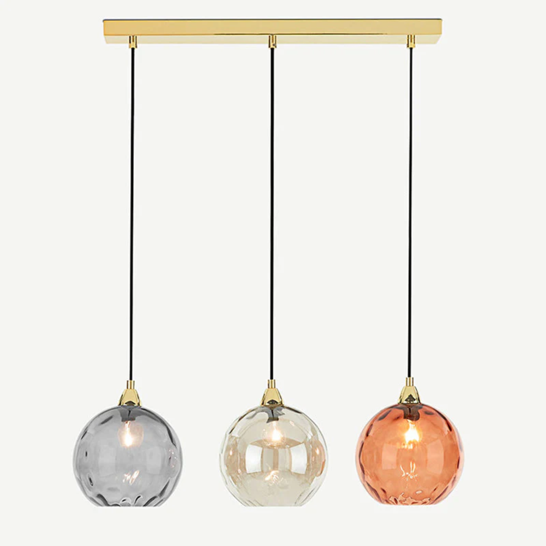 Colorful round adjustable 3-light pendant, a modern cluster light for vibrant interiors.