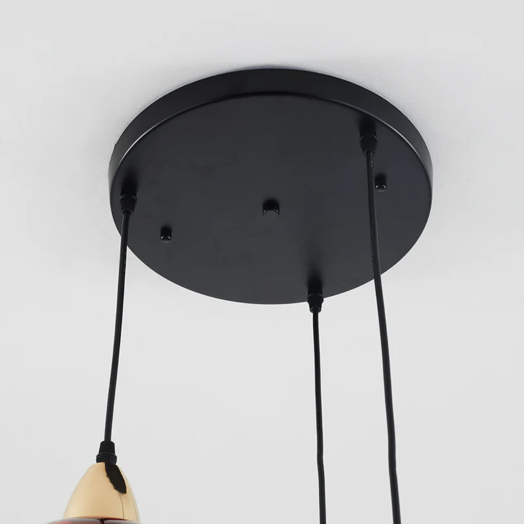 Long adjustable 3-light cluster pendant, a modern ceiling fixture for dining room lighting.