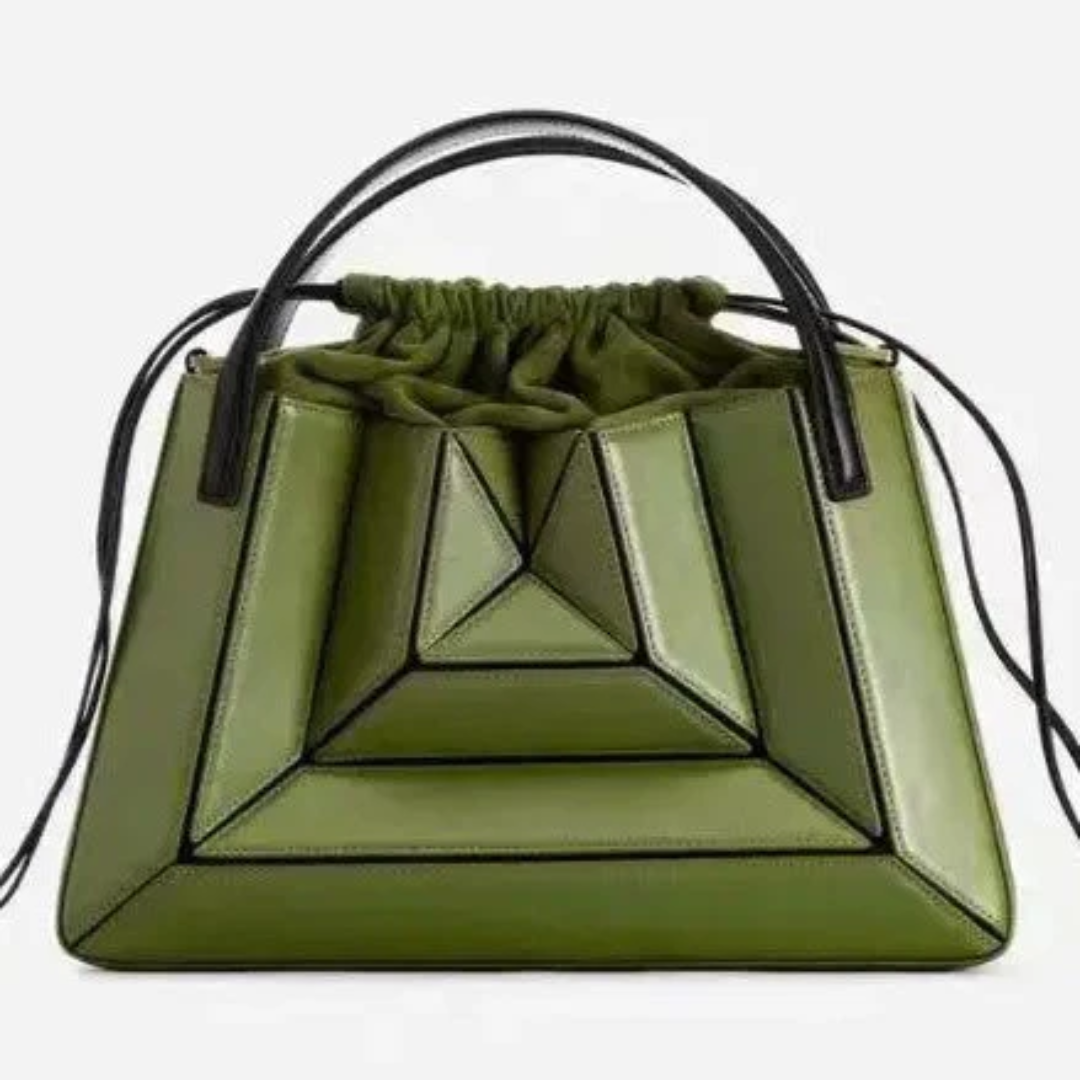 Blue geometric women's handbag, a modern fashion shoulder bag for stylish everyday carry.