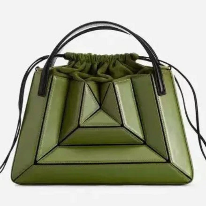 Blue geometric women's handbag, a modern fashion shoulder bag for stylish everyday carry.
