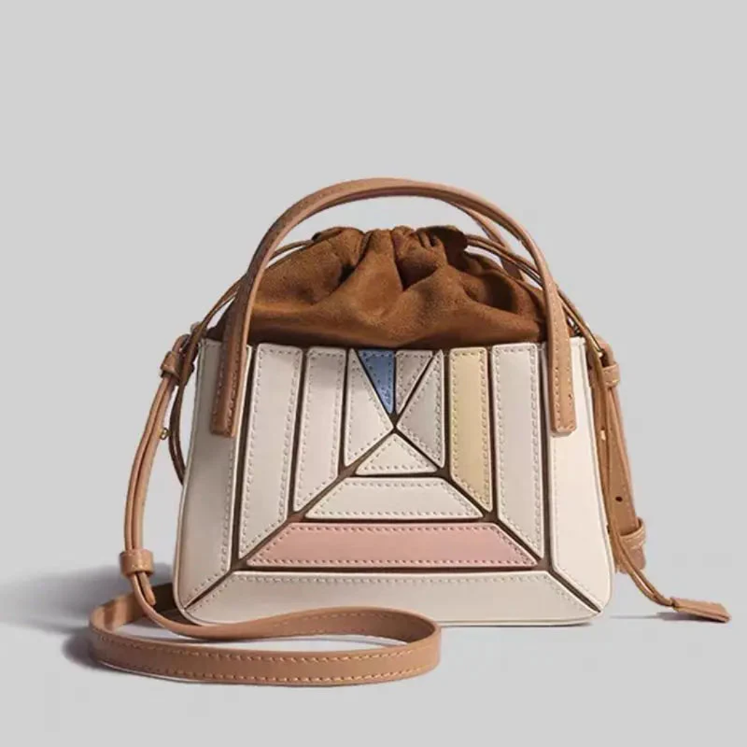 Brown modern geometric handbag for women, versatile everyday carry with a unique design.