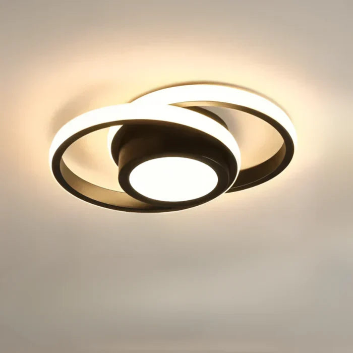 Modern LED flush mount ceiling light, Twilight Rings. Energy-efficient and decorative for contemporary living.