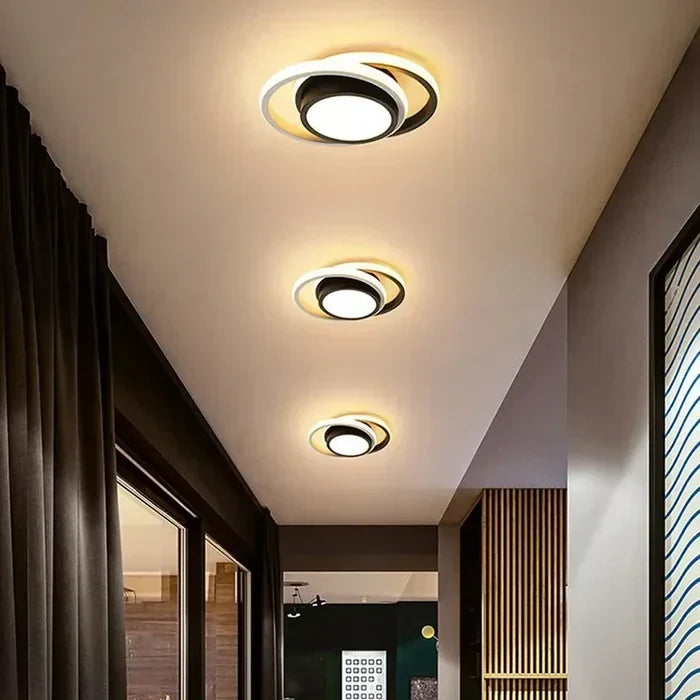 Decorative LED ceiling light, Twilight Rings. Features an elegant double ring design for modern interior decor.
