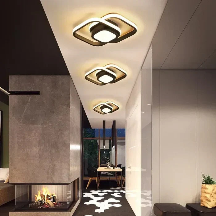 Contemporary LED ceiling fixture, Twilight Rings. Provides warm white light, ideal for living rooms & hallways.