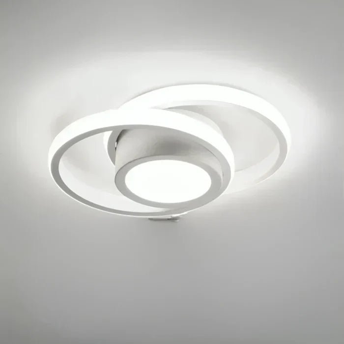 Contemporary LED ceiling light, Twilight Rings. Warm white illumination, suitable for modern interior design.