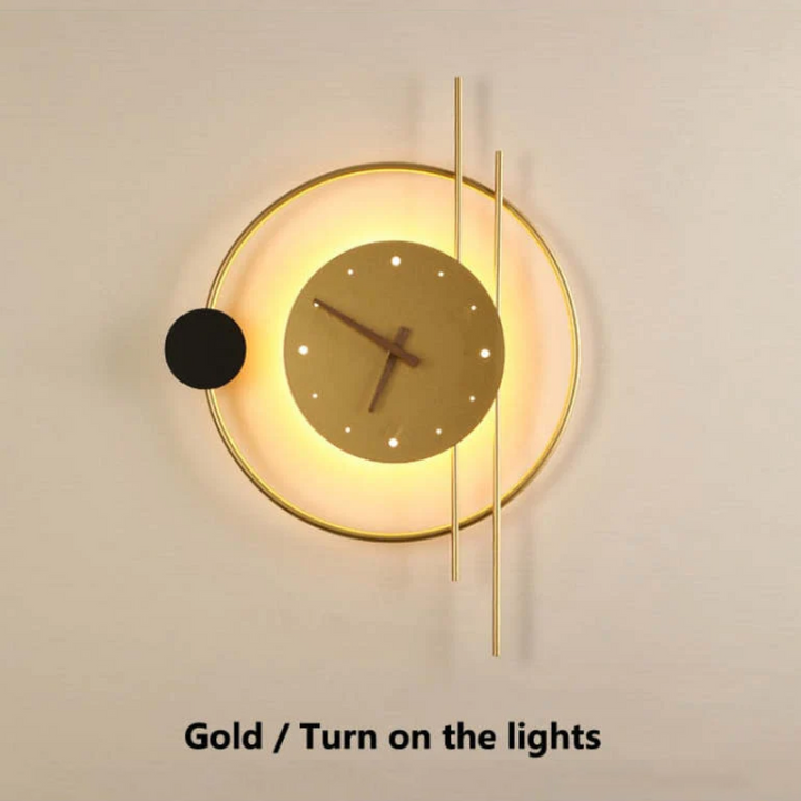 Black & gold modern LED wall clock lamp. Decorative lighting for bedroom or dining room.
