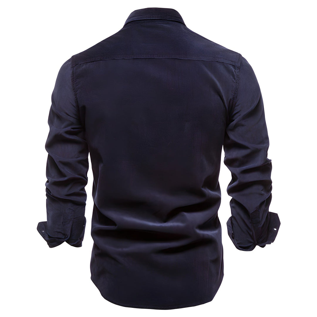 Detailed view of a men's modern button-down shirt fabric, long sleeve, highlighting quality and casual style.