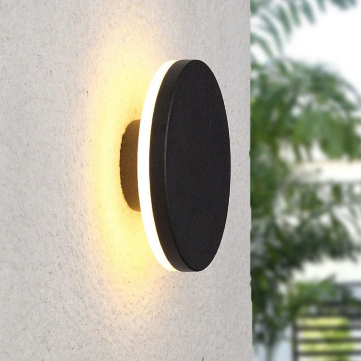Zenith minimalist LED wall lamp complementing modern architecture, stylish outdoor lighting.