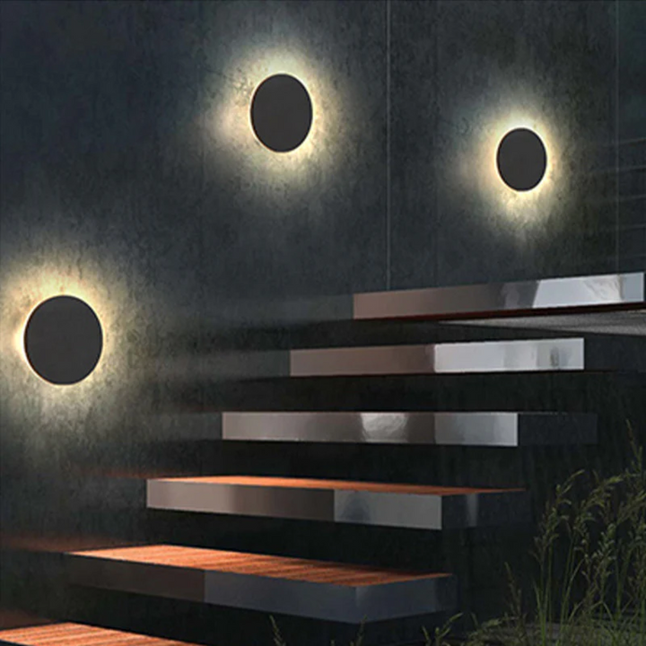 Zenith modern LED wall lamp casting a clean, bright light on an exterior wall, minimalist design.