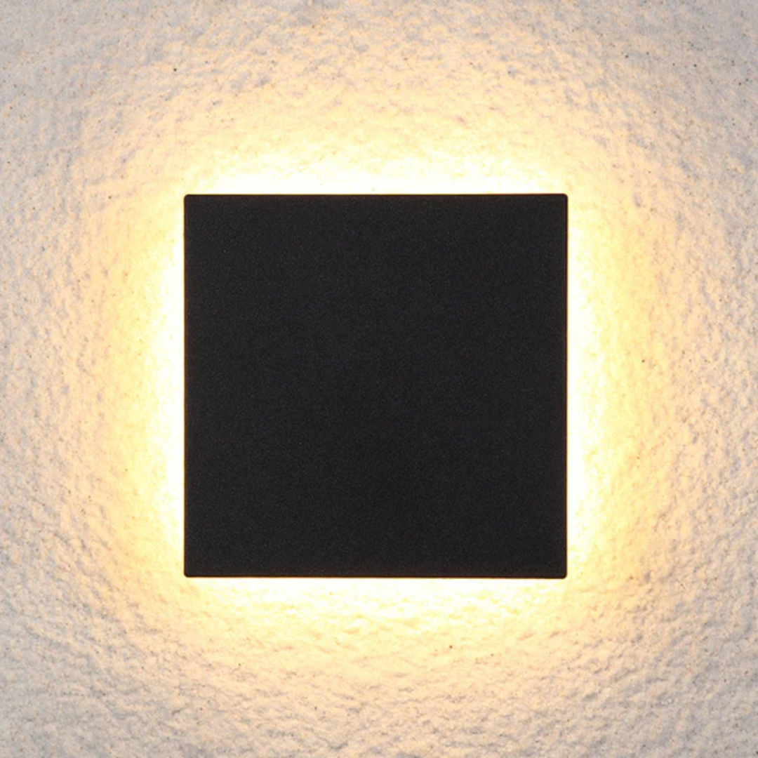 Multiple Zenith modern LED wall lamps enhancing exterior decor, uniform outdoor lighting.