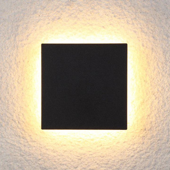 Multiple Zenith modern LED wall lamps enhancing exterior decor, uniform outdoor lighting.