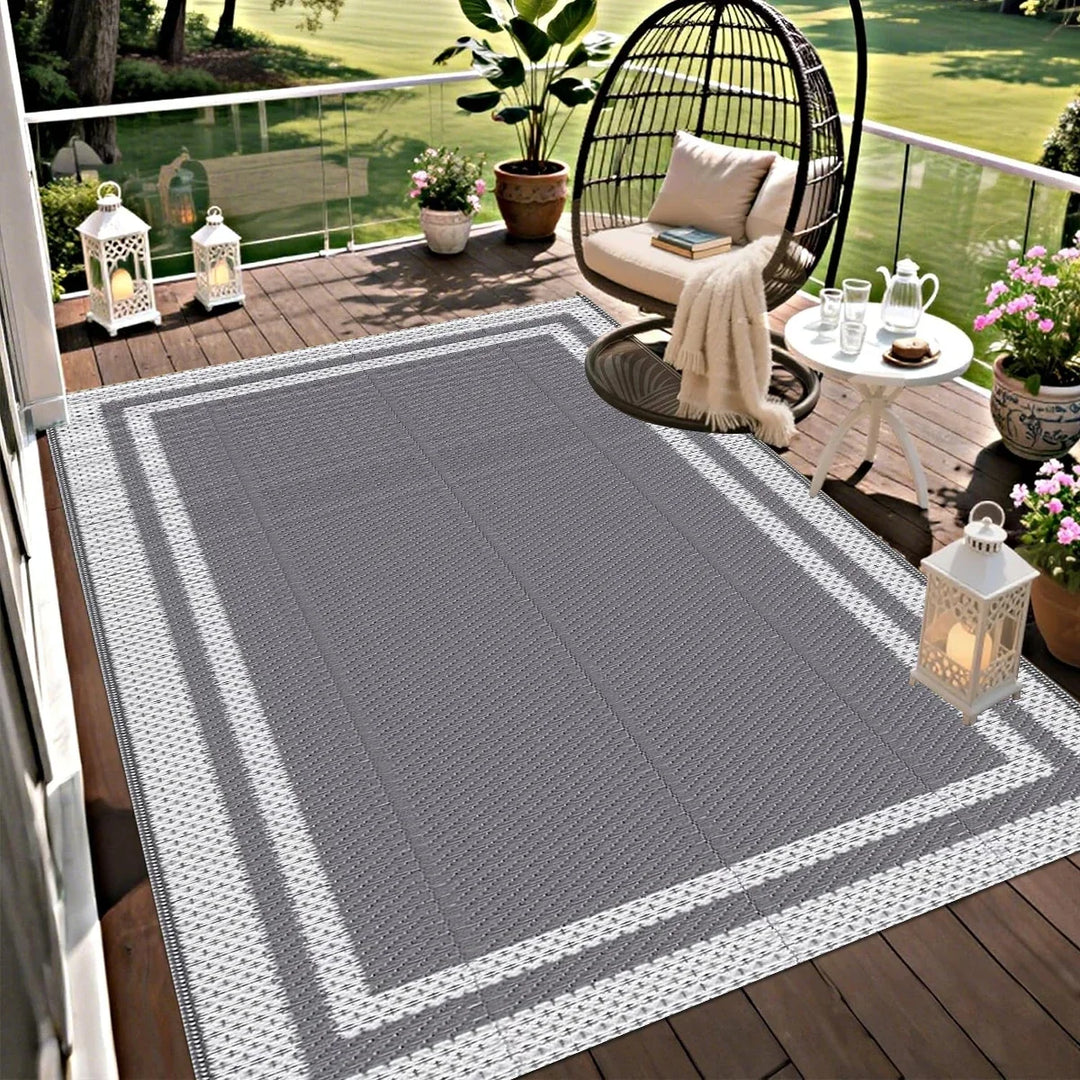 Enhance your patio & deck with this modern grey white geometric outdoor mat. Reversible, easy-clean, & portable decor.