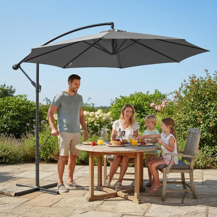 Black outdoor sun shade parasol with easy crank system for patio and garden.