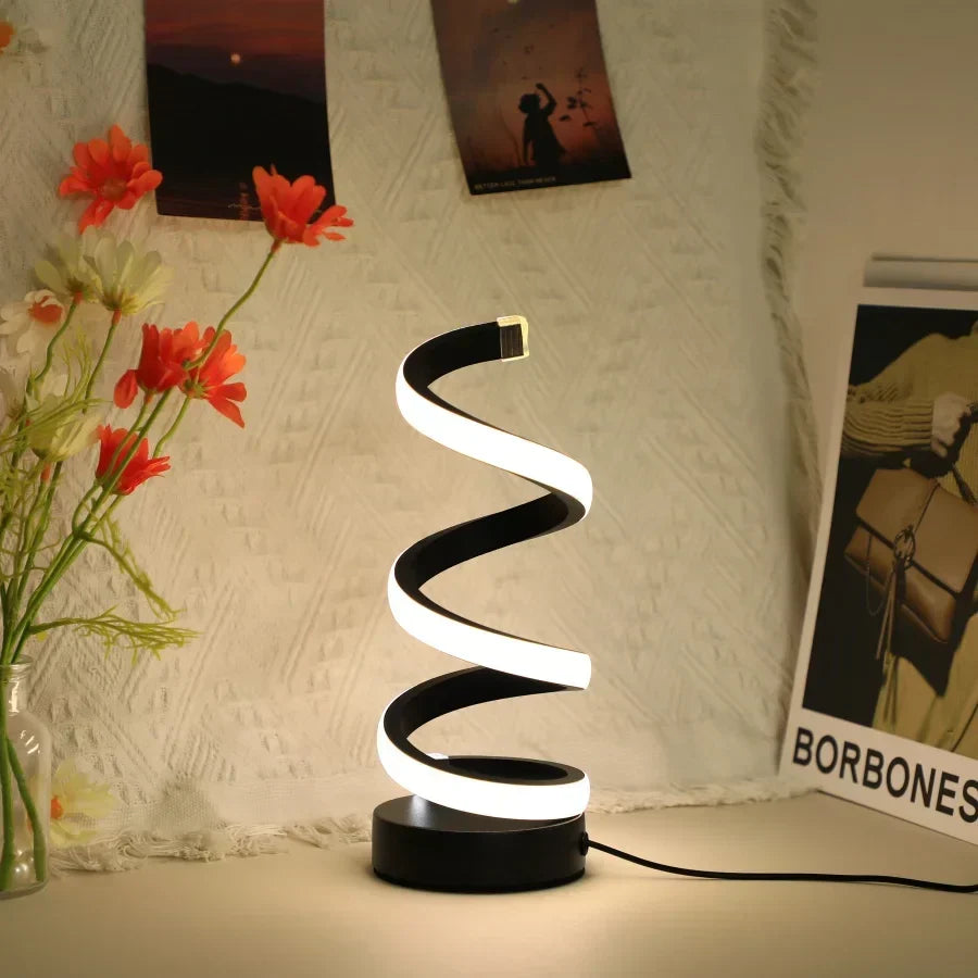 Black S-shaped LED desk lamp. Modern minimalist design, USB powered for home & office eye care work light.