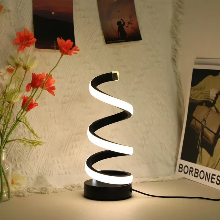 Black S-shaped LED desk lamp. Modern minimalist design, USB powered for home & office eye care work light.