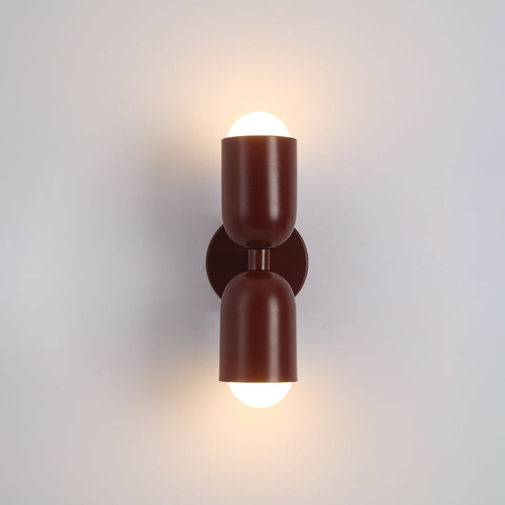 Dual bulb wall sconce, offering elegant accent lighting for living rooms & hallways.
