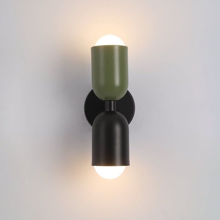 Contemporary wall-mounted lamp, providing soft indoor lighting for a modern bedroom.