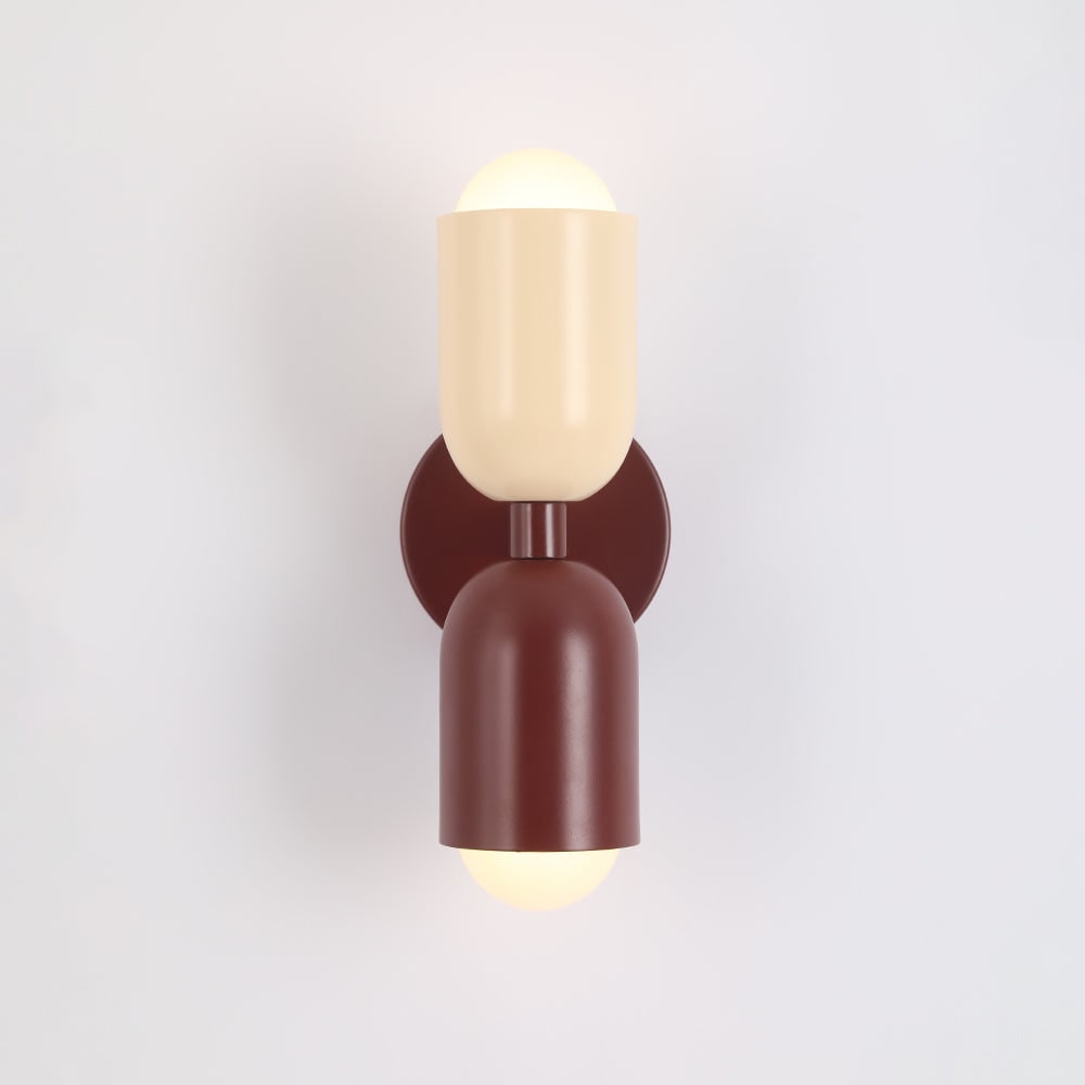 Stylish dual bulb fixture for wall decor, enhancing modern indoor lighting schemes.