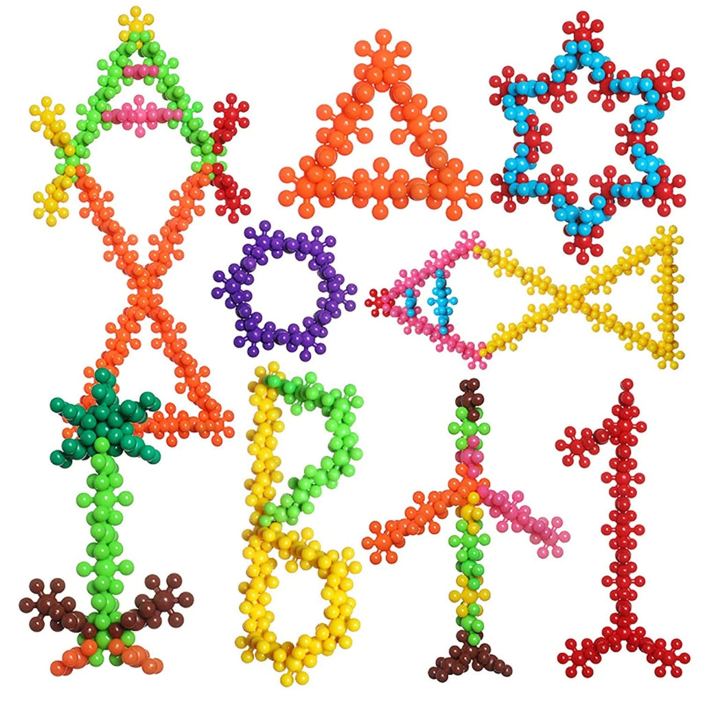 Children playing with colorful Montessori building blocks, encouraging creative problem-solving.