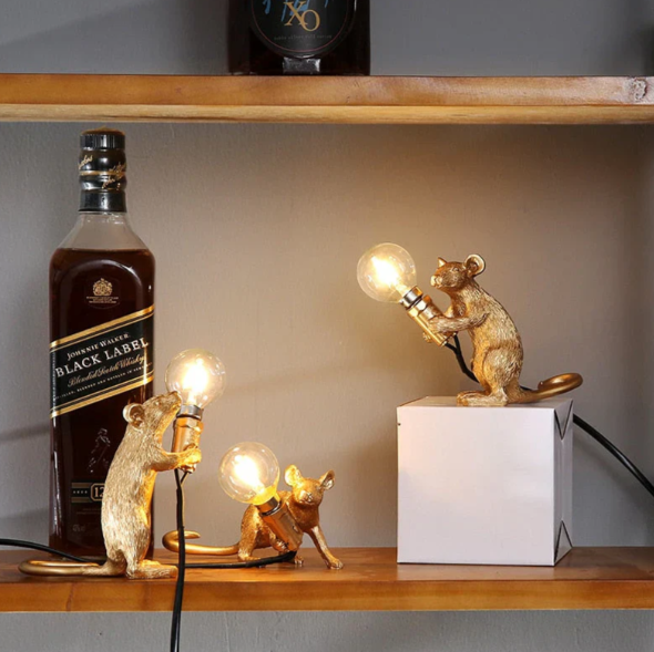 Adorable mouse lamp, a decorative table lamp creating a playful ambiance, great for animal-themed decor.