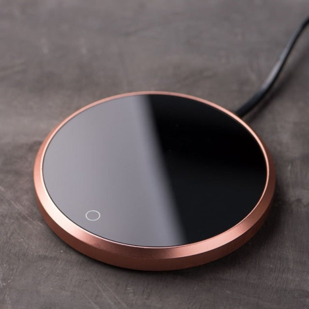 Temperature control electric mug warmer. Perfect for keeping coffee, tea, and drinks hot.
