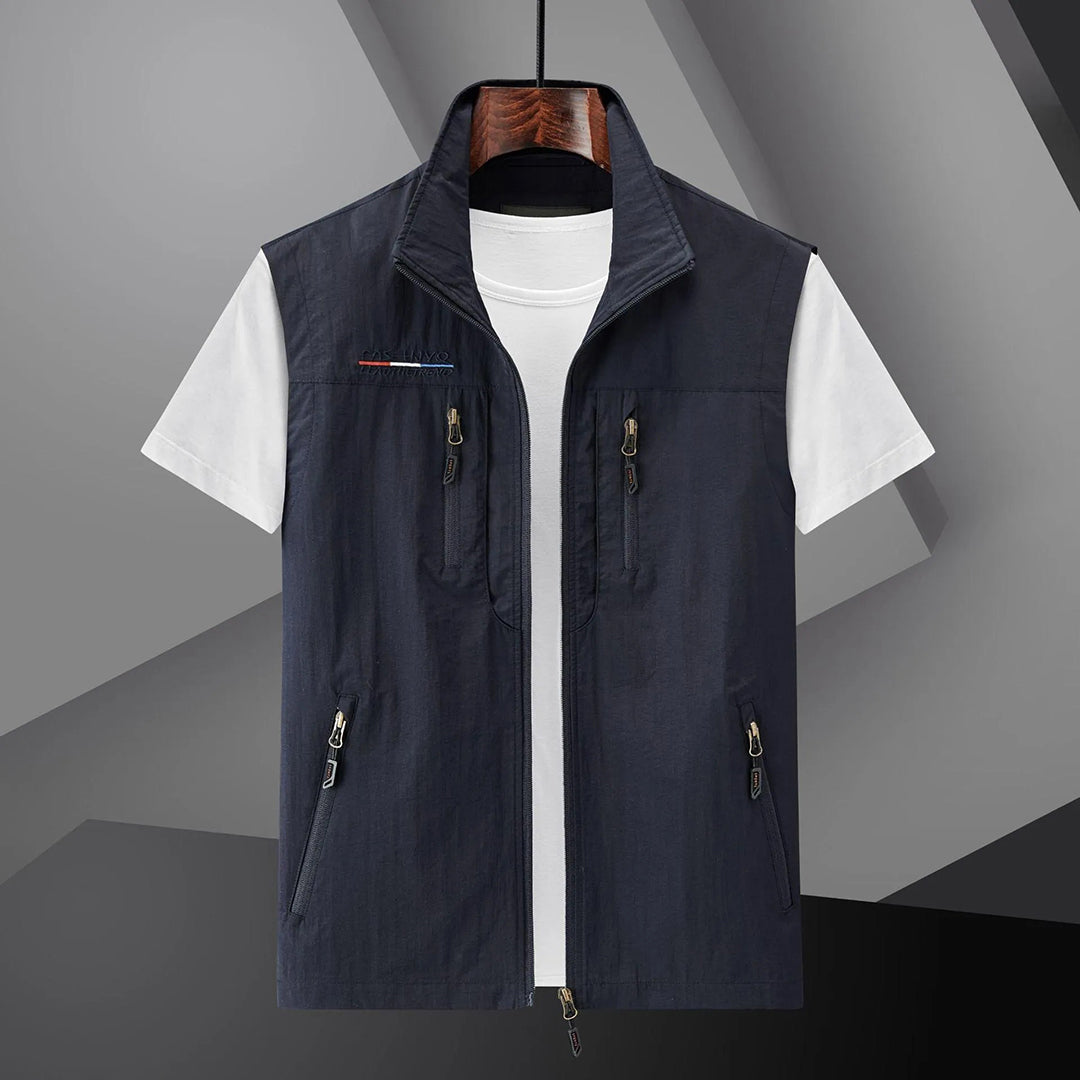 Men's multi-pocket utility vest for outdoor travel, fishing, or hiking. Lightweight & practical summer gear.