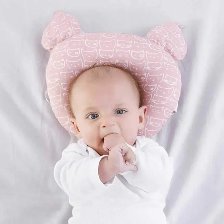 Soft cotton ergonomic nursing pillow, a comfortable mom essential for relaxed breastfeeding and infant care.