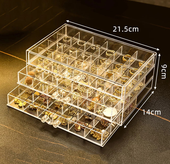Clear acrylic multilayer jewelry organizer for necklaces, rings, & earrings.