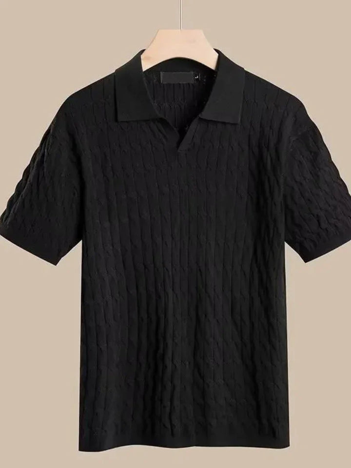 Close-up of collar on a sleek men's muscle fit knit polo, smart casual design.