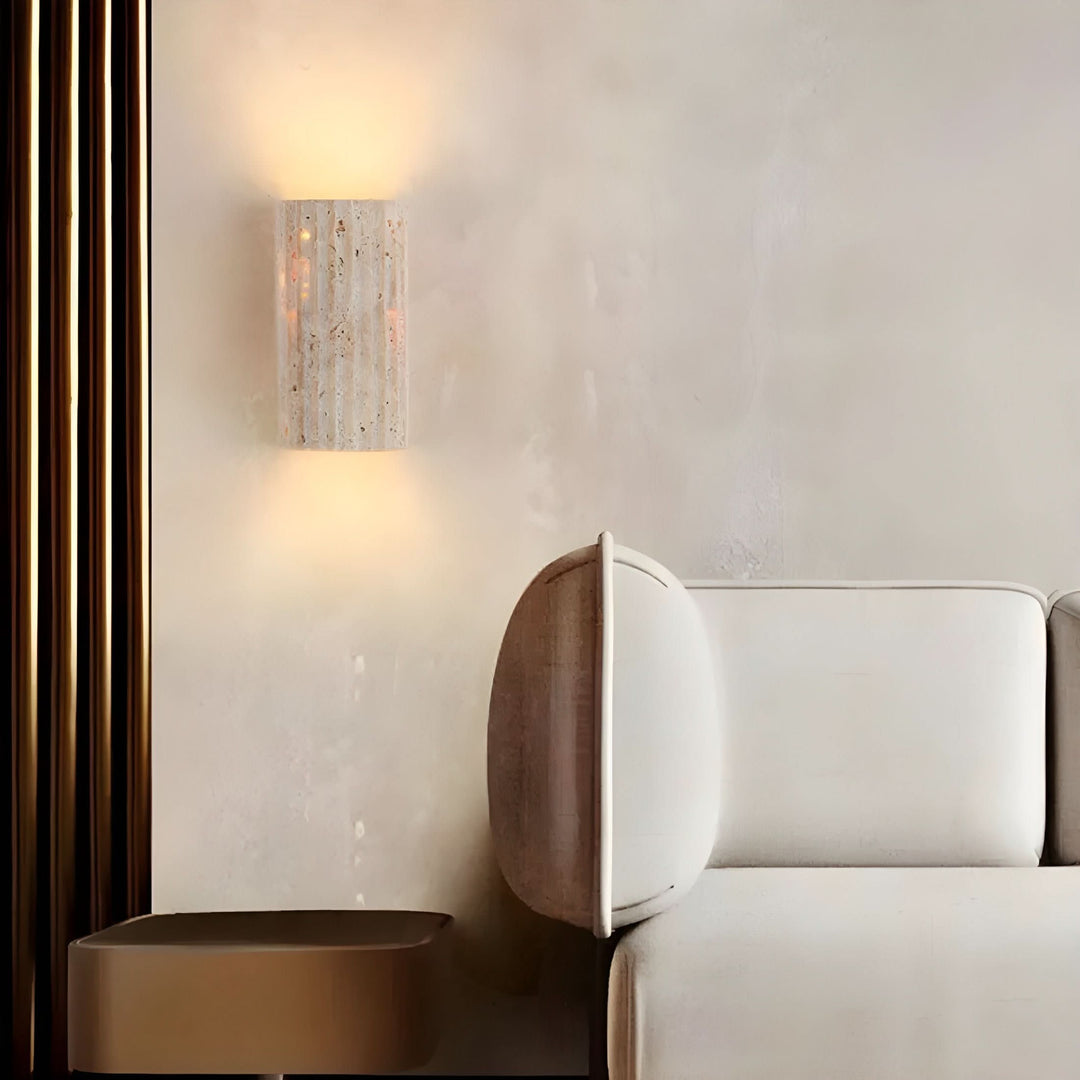 Contemporary natural stone wall sconce with integrated LED for stylish ambient lighting.
