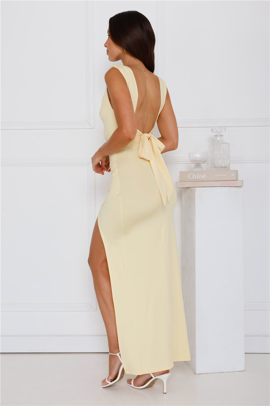 Close-up of the ruched bodice and square neckline on a women's formal maxi dress.