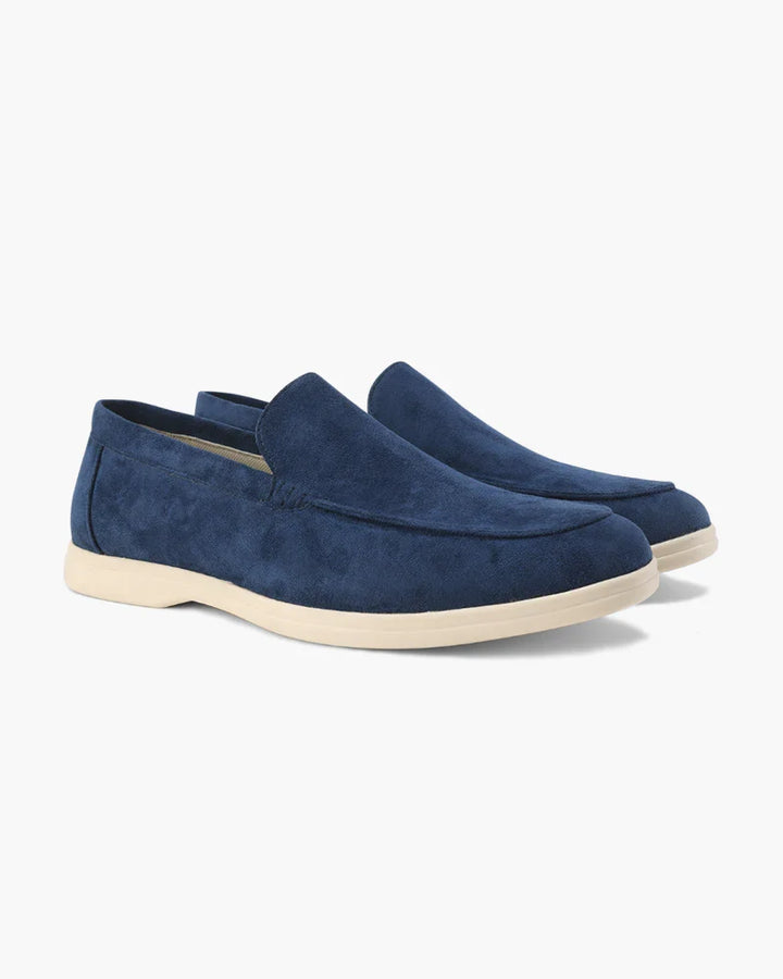 Comfortable men's navy slip-on moccasin loafers, ideal for lightweight, easy everyday casual wear.