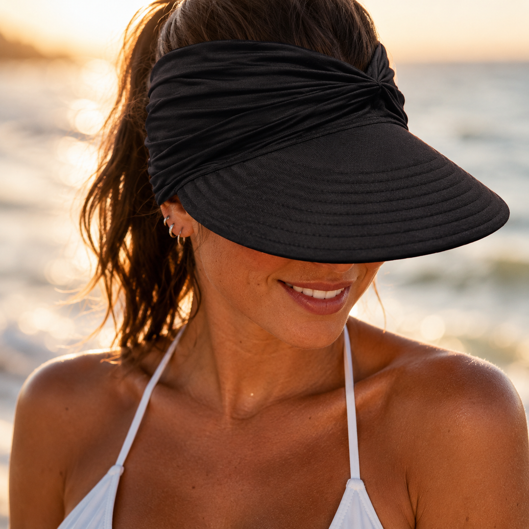 Women's UPF 50+ wide brim sun visor hat, packable for beach & travel, ultimate UV protection.